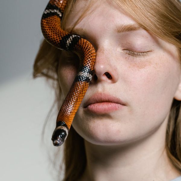 Serene woman meditating, symbolizing inner strength and peace.